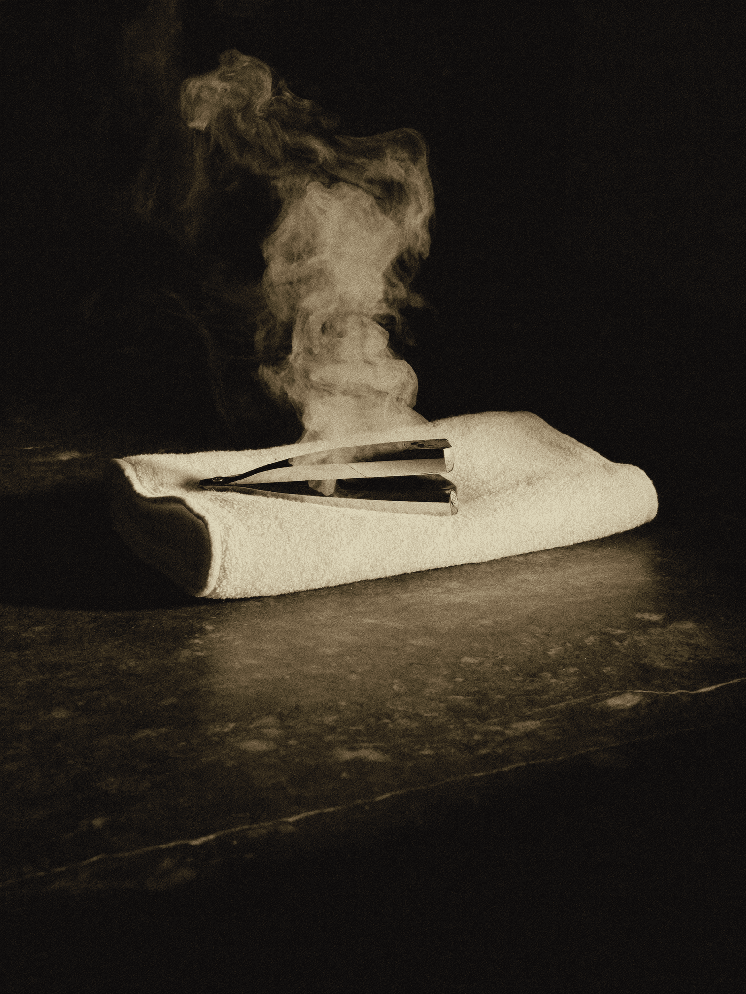 Hot towel and straight razor ready for a shave at Shop 13